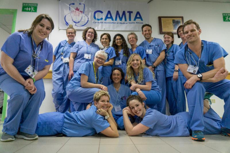 CAMTA Medical association posing for a friendly group photo smiling